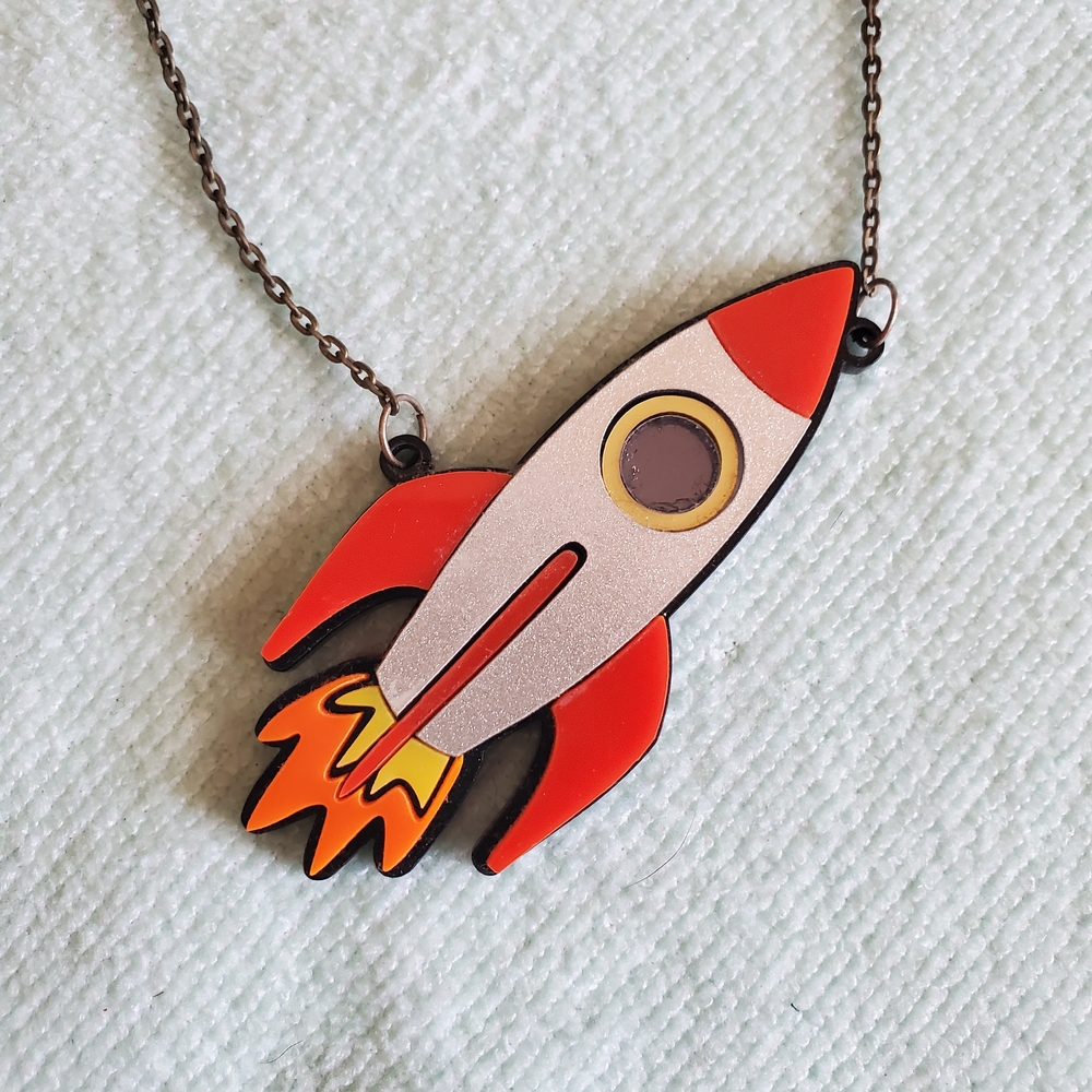 Skully Bunting Acrylic Rocketship Necklace View 2